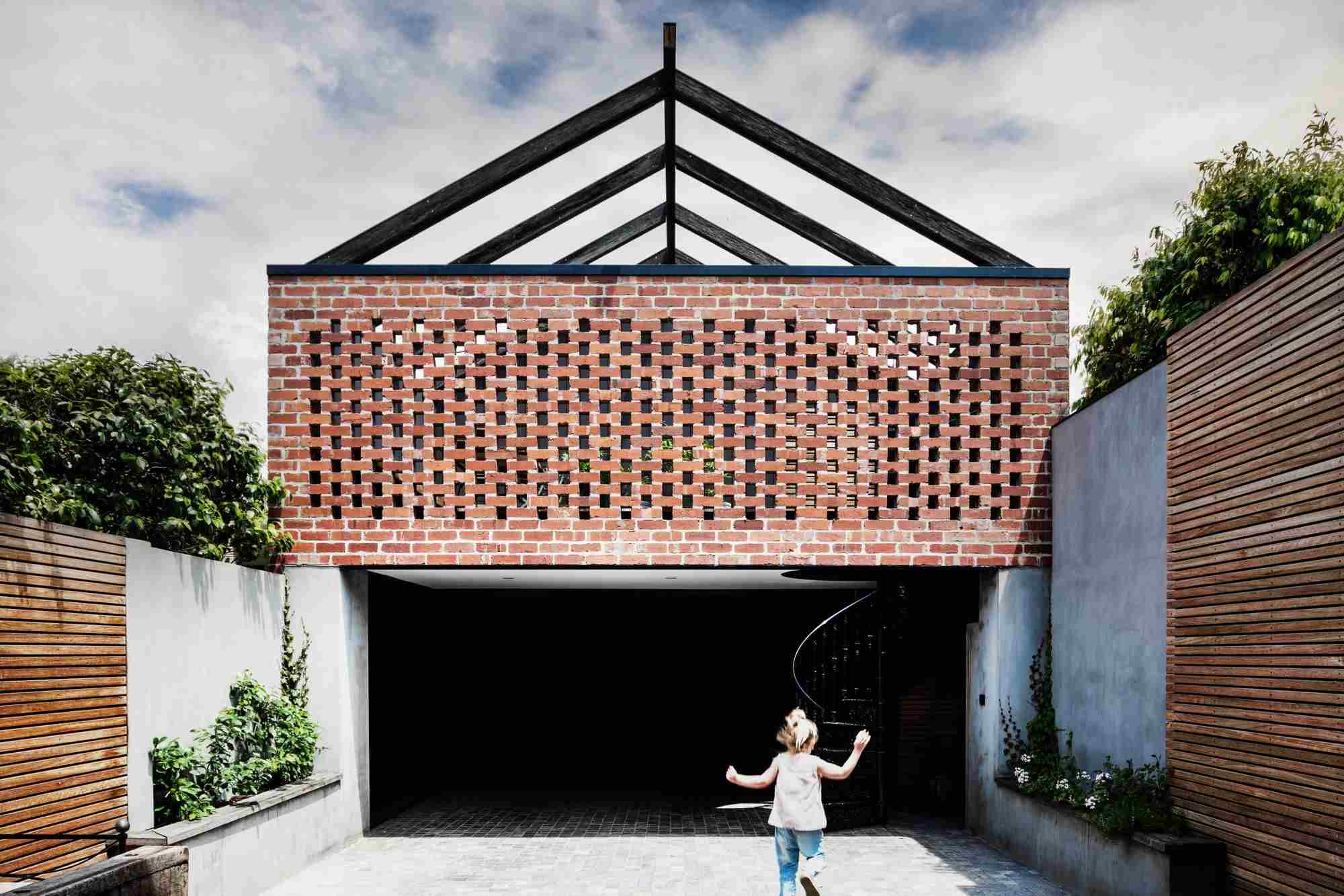 Girl infornt of a house