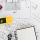 construction planning documents being reviewed